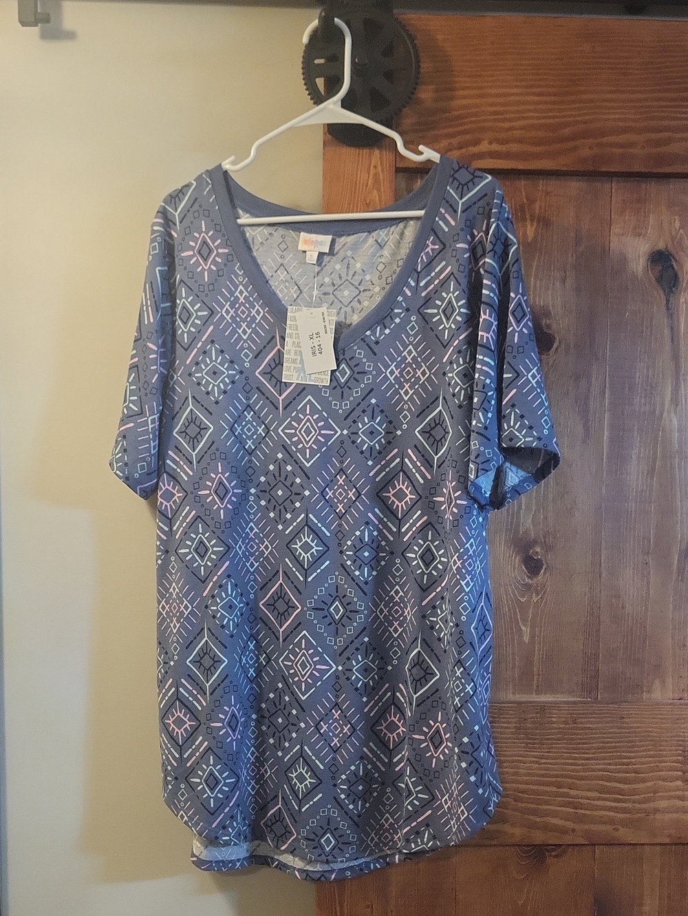 LuLaRoe XL Iris Blue Geometric V-Neck Top with Pastel Accents